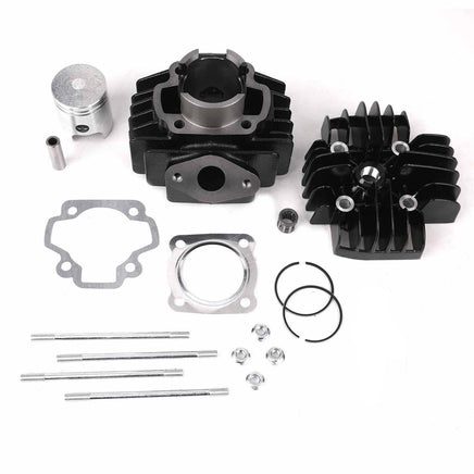 Engine parts including cylinders, gaskets, and spark plugs on a white background